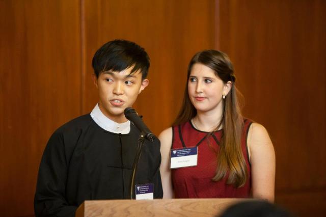 The Myanmar Project co-founders Edward Han Myo Oo and Katie Aragon deliver a welcome speech for Daw Suu during the Chubb Fellowship dinner in Yale's Timothy Dwight College